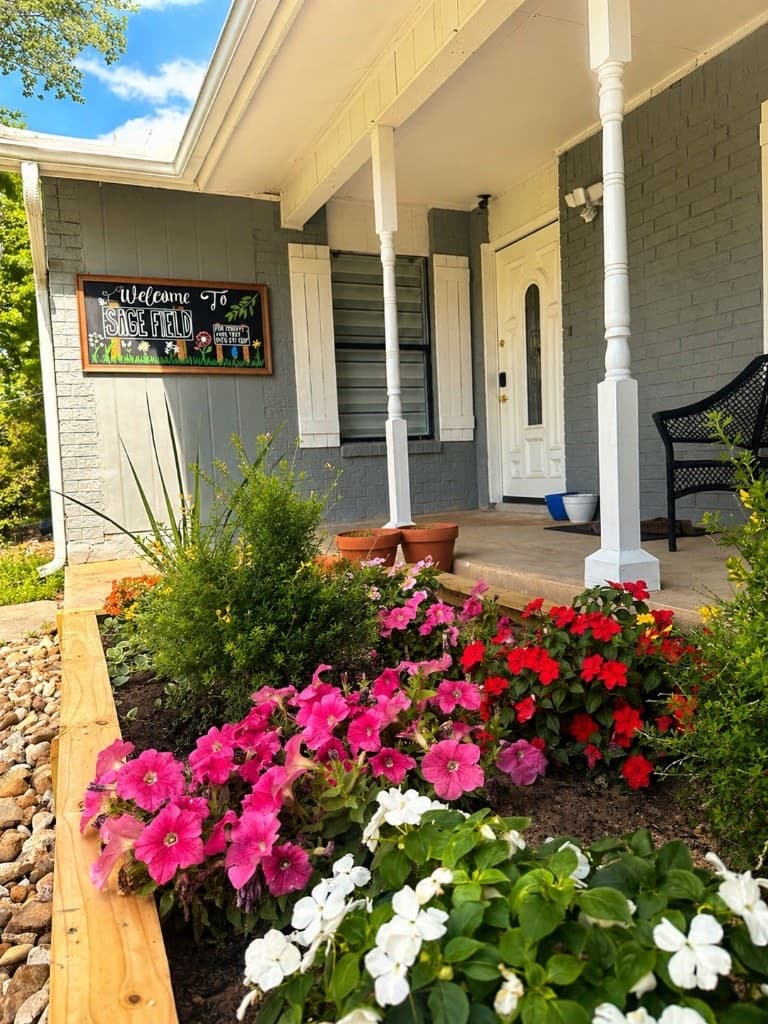 Sage Field school entrance with flowers